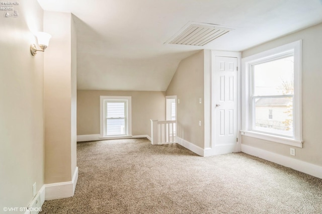 509 College Ave, Fostoria, OH 44830 - additional living space featuring carpet flooring, lofted ceiling, and baseboards