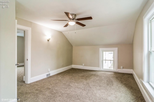 509 College Ave, Fostoria, OH 44830 - bonus room featuring carpet floors, ceiling fan, lofted ceiling, and baseboards