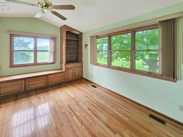 110 Orchard Grove Dr, Clyde, OH 43410 - spare room with lofted ceiling, light wood finished floors, baseboards, and a ceiling fan