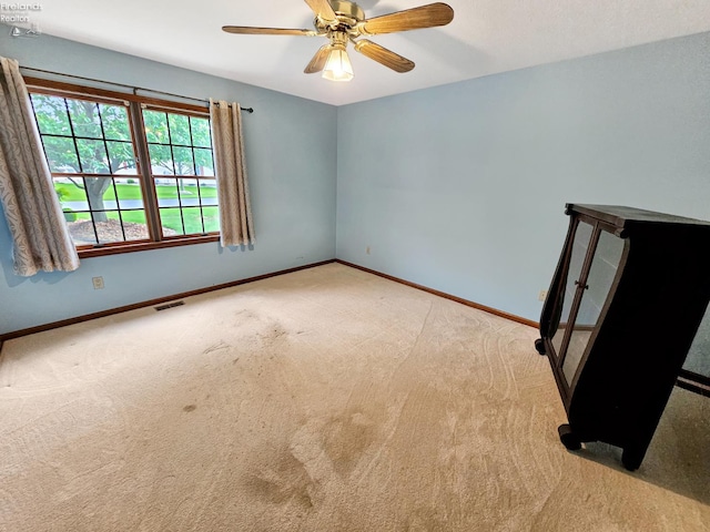 110 Orchard Grove Dr, Clyde, OH 43410 - carpeted empty room featuring baseboards and ceiling fan