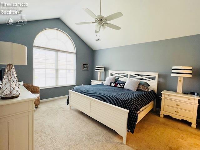 2780 Canterbury Ln Unit A, Port Clinton, OH 43452 - bedroom with light colored carpet, lofted ceiling, ceiling fan, and baseboards