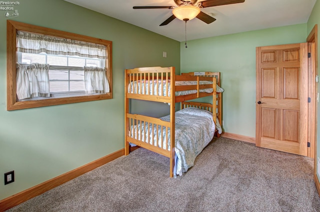 5475 E Mabel Dr, Port Clinton, OH 43452 - carpeted bedroom featuring baseboards and a ceiling fan