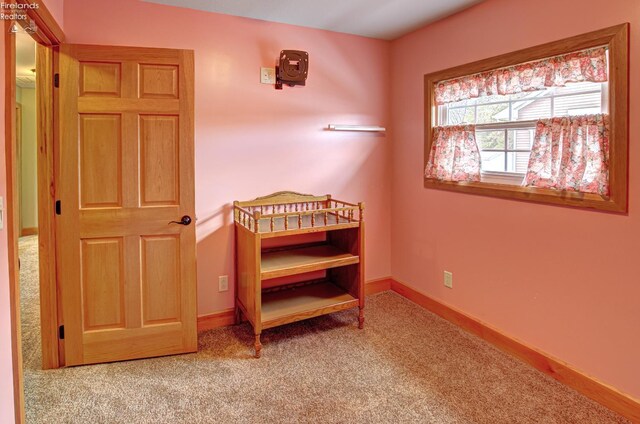 5475 E Mabel Dr, Port Clinton, OH 43452 - bedroom with carpet flooring and baseboards