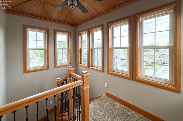 5475 E Mabel Dr, Port Clinton, OH 43452 - hallway with an upstairs landing, wooden ceiling, baseboards, and wood finished floors