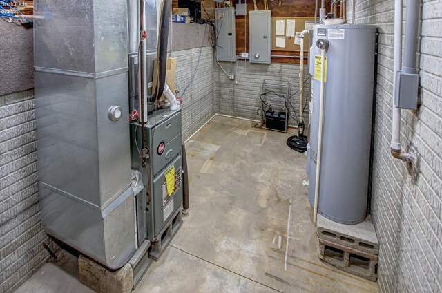 5475 E Mabel Dr, Port Clinton, OH 43452 - utility room featuring gas water heater, electric panel, and heating unit