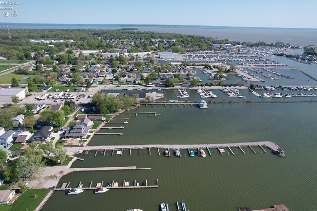 5475 E Mabel Dr, Port Clinton, OH 43452 - aerial view of property and surrounding area with a large body of water and numerous boat docks