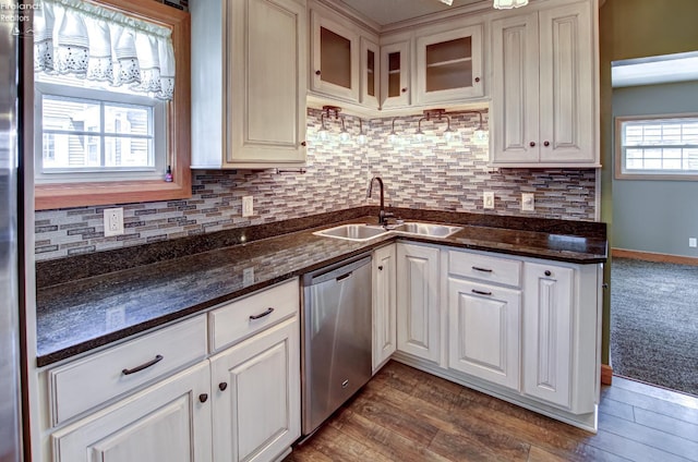5475 E Mabel Dr, Port Clinton, OH 43452 - kitchen with a sink, dishwasher, tasteful backsplash, and dark stone countertops