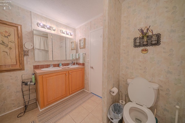 8896 White Crane Way, Oak Harbor, OH 43449 - full bathroom featuring ornamental molding, tile patterned flooring, double vanity, toilet, and wallpapered walls