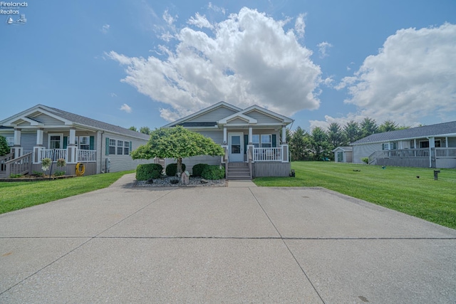 8896 White Crane Way, Oak Harbor, OH 43449 - view of front of property with covered porch and a front yard