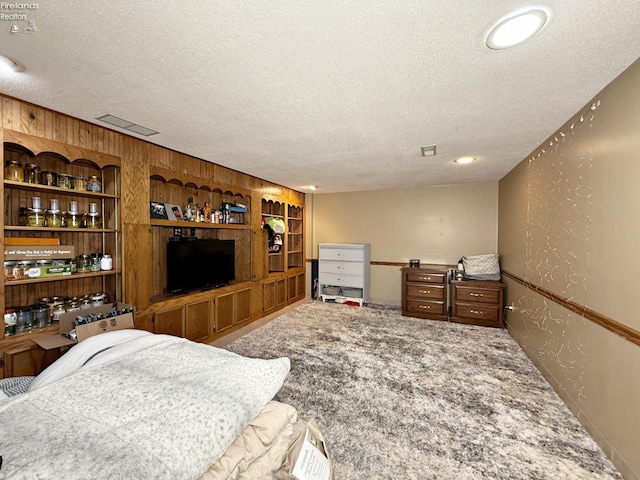 38 N Tecumseh Trl, Tiffin, OH 44883 - carpeted bedroom with a textured ceiling
