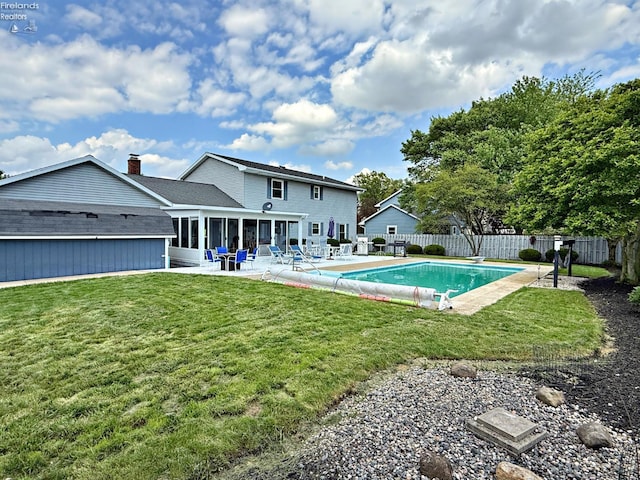 38 N Tecumseh Trl, Tiffin, OH 44883 - view of swimming pool with a sunroom and a patio