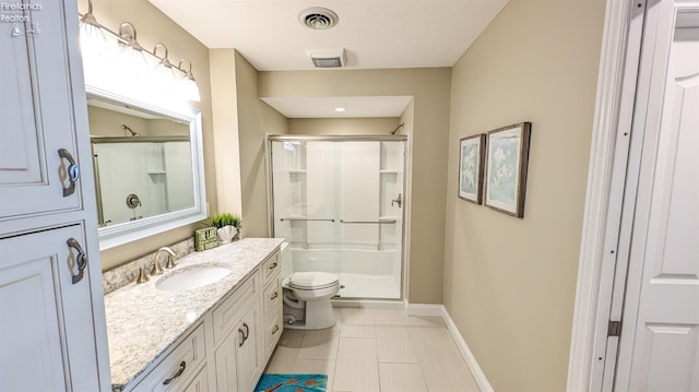 3088 N Marina View Dr Unit 12, Port Clinton, OH 43452 - full bath featuring a stall shower, vanity, baseboards, toilet, and tile patterned floors