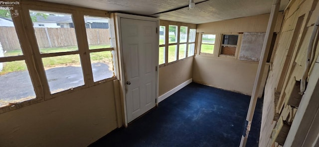 1037 Fishlock Ave, Findlay, OH 45840 - unfurnished sunroom featuring unfinished concrete floors