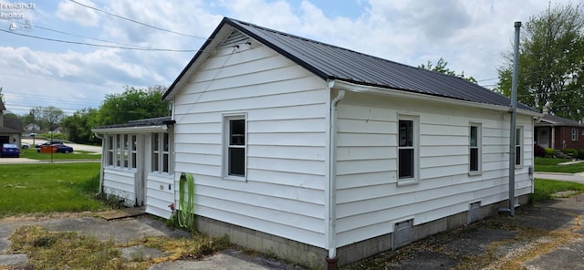 1037 Fishlock Ave, Findlay, OH 45840 - view of home's exterior with metal roof