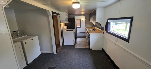 1037 Fishlock Ave, Findlay, OH 45840 - washroom featuring washer and clothes dryer, baseboards, dark colored carpet, and arched walkways