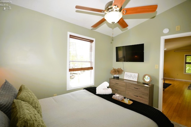 765 Riverside, Vermilion, OH 44089 - bedroom featuring wood finished floors, a ceiling fan, and baseboards
