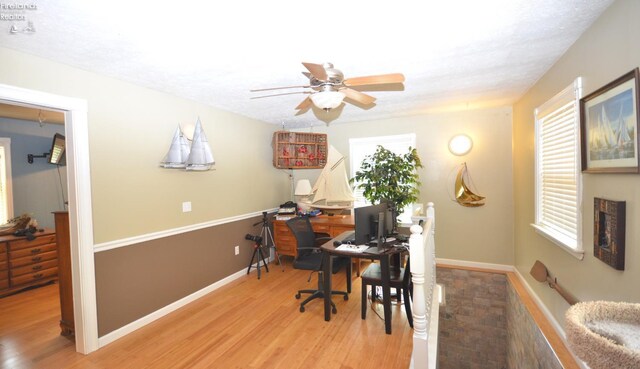 765 Riverside, Vermilion, OH 44089 - office area with a ceiling fan, wood finished floors, and baseboards