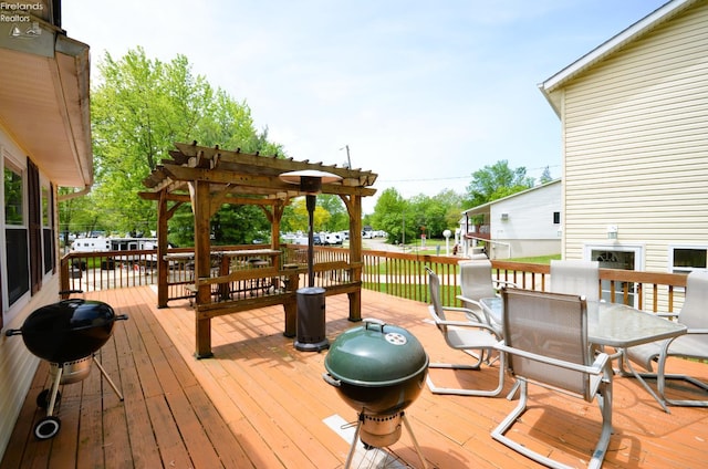 765 Riverside, Vermilion, OH 44089 - wooden deck with a pergola, grilling area, and outdoor dining space