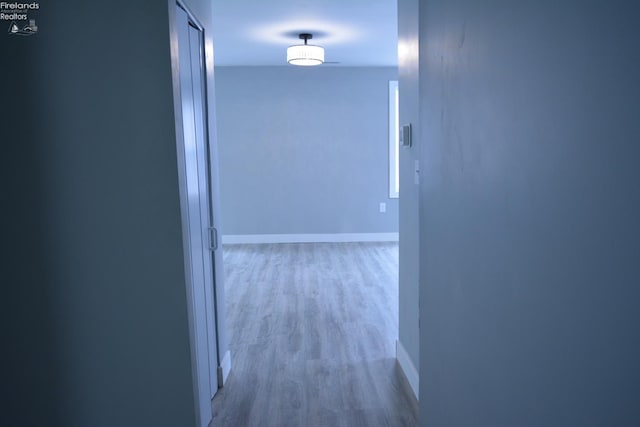 26 Marshall St, Norwalk, OH 44857 - corridor featuring baseboards and wood finished floors
