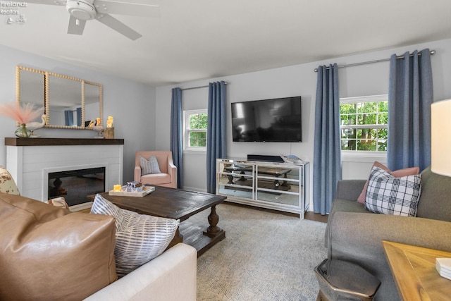 625 Laurel Ave, Port Clinton, OH 43452 - living room with a ceiling fan, a glass covered fireplace, and wood finished floors