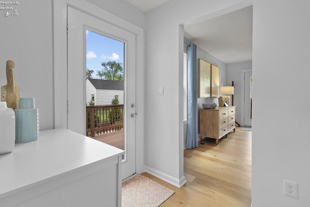 625 Laurel Ave, Port Clinton, OH 43452 - doorway to outside with light wood-style floors and baseboards