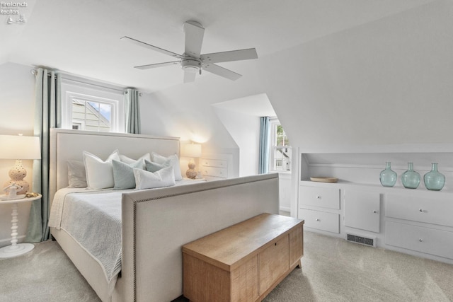 625 Laurel Ave, Port Clinton, OH 43452 - bedroom with carpet floors, lofted ceiling, multiple windows, and a ceiling fan