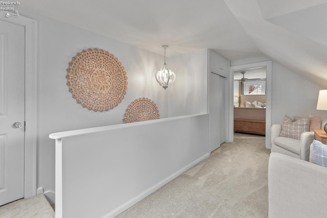 625 Laurel Ave, Port Clinton, OH 43452 - corridor featuring carpet flooring, lofted ceiling, and baseboards