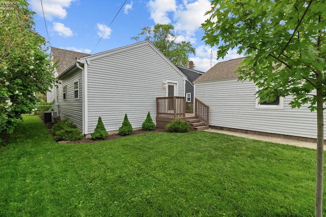 625 Laurel Ave, Port Clinton, OH 43452 - rear view of property featuring a yard, a deck, and cooling unit