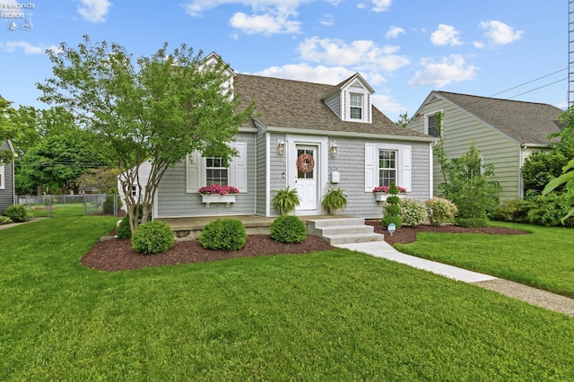 625 Laurel Ave, Port Clinton, OH 43452 - new england style home featuring roof with shingles