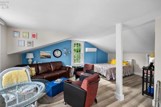 236 Elm Ave, Lakeside, OH 43440 - bedroom featuring a wall mounted AC, wood finished floors, vaulted ceiling, and baseboards
