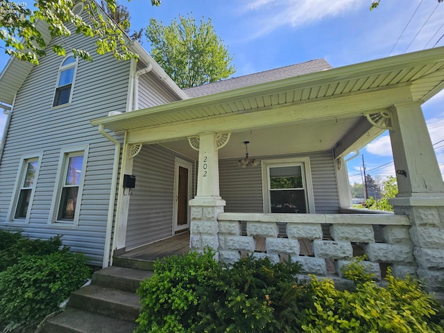 202 Duane St, Clyde, OH 43410 - doorway to property with covered porch