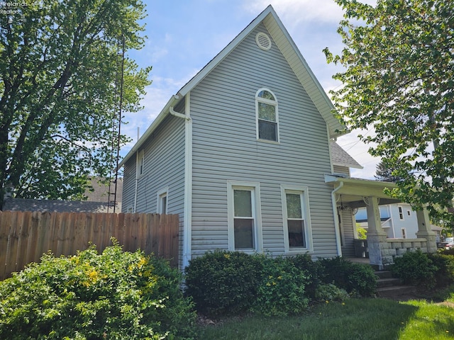 202 Duane St, Clyde, OH 43410 - view of front of house featuring fence and a porch