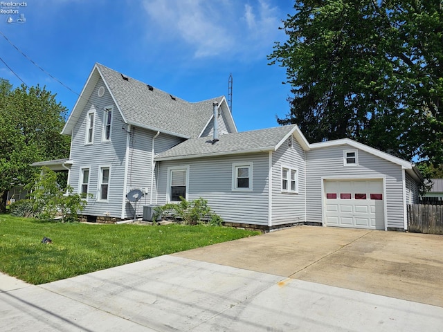 202 Duane St, Clyde, OH 43410 - view of side of home with a shingled roof, a garage, a lawn, driveway, and cooling unit