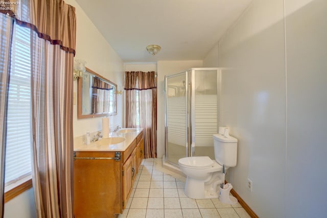 419 Kinney St, Bellevue, OH 44811 - full bathroom with tile patterned floors, toilet, a shower stall, and vanity