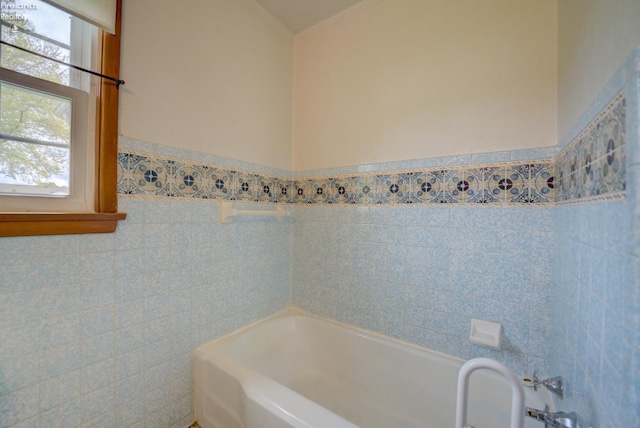 419 Kinney St, Bellevue, OH 44811 - full bathroom featuring tile walls, a tub to relax in, and a wainscoted wall