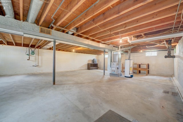419 Kinney St, Bellevue, OH 44811 - basement featuring water heater and gas meter