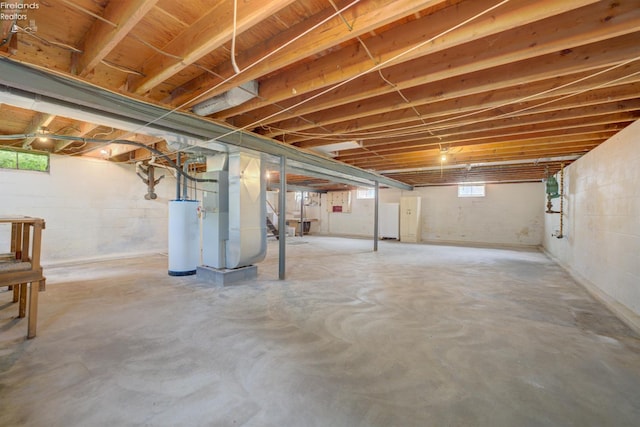 419 Kinney St, Bellevue, OH 44811 - basement with water heater and heating unit
