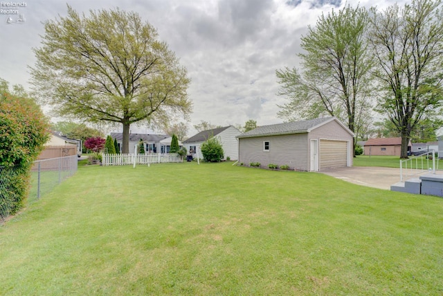 419 Kinney St, Bellevue, OH 44811 - view of yard with an outbuilding and a garage
