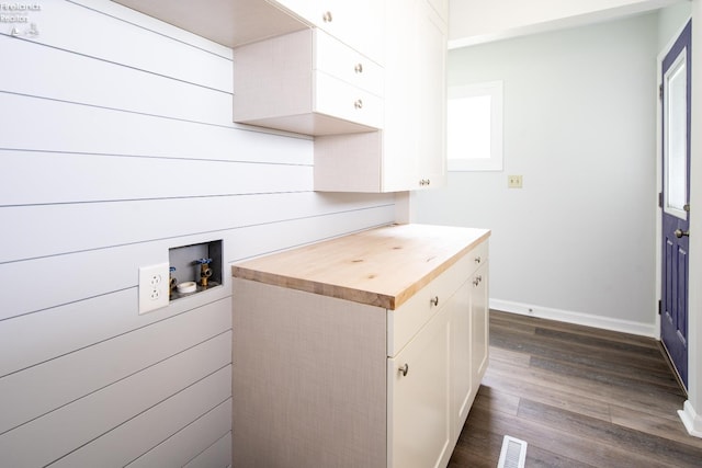 6039 E Harbor Rd Unit 8, Marblehead, OH 43440 - clothes washing area with cabinet space, dark wood finished floors, washer hookup, and baseboards