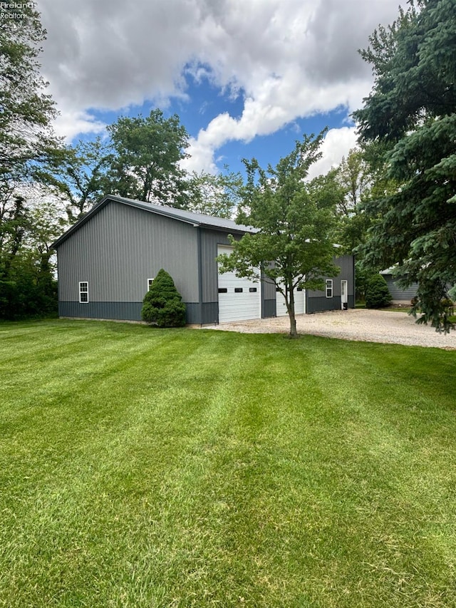 3960 Everingin Rd, Monroeville, OH 44847 - view of property exterior featuring an outdoor structure, a lawn, and an outbuilding