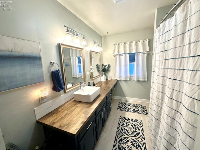 1432 River Dr, Fremont, OH 43420 - full bathroom featuring vanity, tile patterned flooring, and a shower with shower curtain