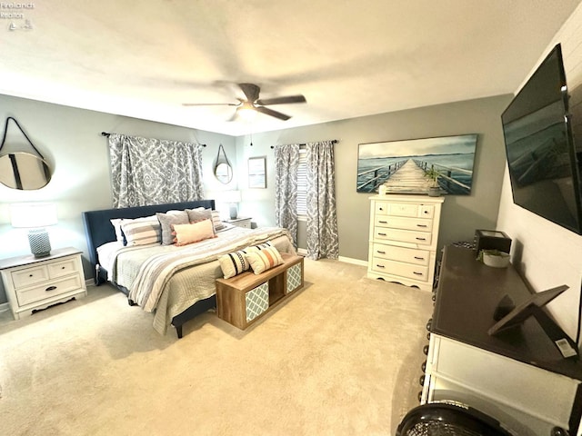 1432 River Dr, Fremont, OH 43420 - bedroom with light carpet and ceiling fan