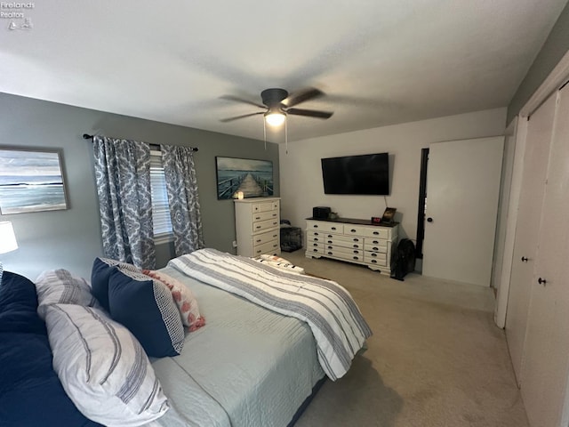 1432 River Dr, Fremont, OH 43420 - bedroom with light carpet, a closet, and a ceiling fan