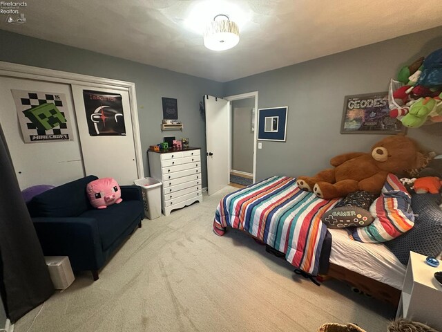 1432 River Dr, Fremont, OH 43420 - bedroom featuring carpet