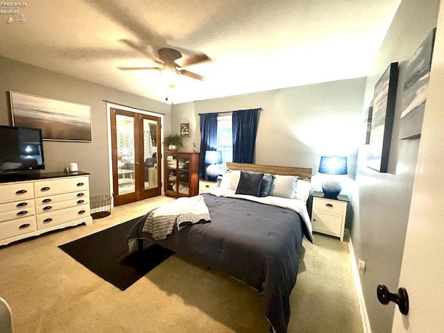 1432 River Dr, Fremont, OH 43420 - carpeted bedroom featuring french doors, access to exterior, and ceiling fan