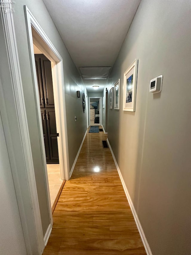 1432 River Dr, Fremont, OH 43420 - hall with light wood-type flooring and baseboards