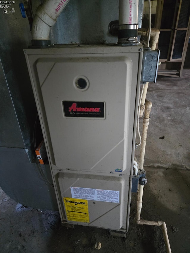91 1st Ave, Tiffin, OH 44883 - utility room featuring heating unit