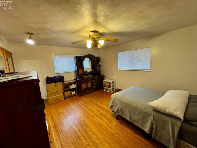 104 N Wood St, Fremont, OH 43420 - bedroom with light wood-style floors and a ceiling fan