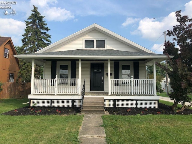 498 E Market St, Tiffin, OH 44883 - view of front facade with covered porch and roof with shingles