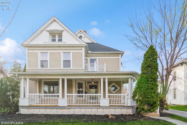 235 W Buckeye, Clyde, OH 43410 - victorian house featuring a porch and a balcony